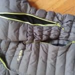 Il dettaglio della tasca e la cerniera di aerazione della Camp Nivix Alpine Jacket