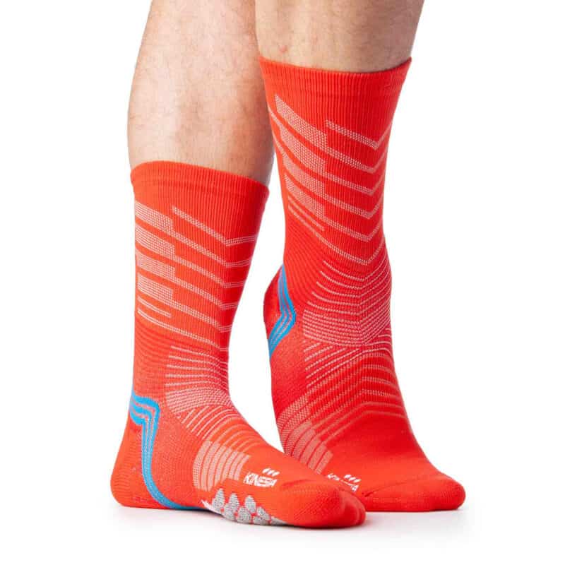 Calze propriocettive Kinesia Achilles Crew, in rosso.